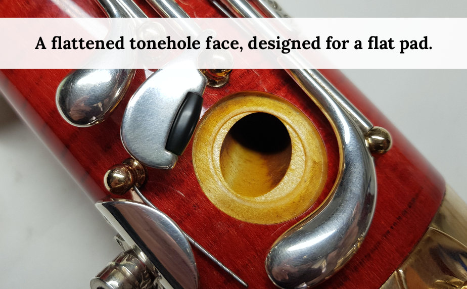 Flattened bassoon tonehole face